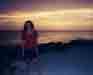 Andrea on beach at sunset